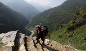 Maila on a new stretch of footpath that he helped build.