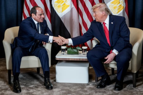 Donald Trump shakes hands with Abdel Fattah al-Sisi during a bilateral meeting at the World Economic Forum in Davos, Switzerland, in January 2026.