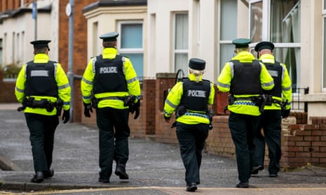 PSNI officers patrol a student area of Belfast.