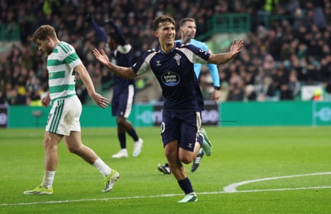 Javi Rodriguez smiles with arms outstretched, celebrating a goal for Celta Vigo