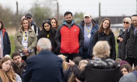 Azeem Rafiq listens to Holocaust survivors during the 2022 March of the Living
