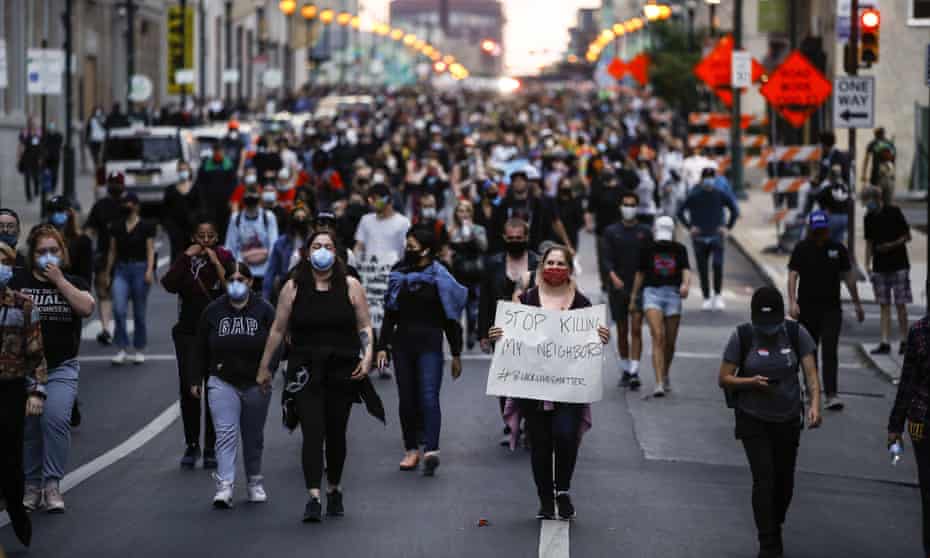 Demonstrators march in Philadelphia to protest the death of George Floyd.