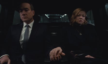 Shiv with her husband Tom in a car.