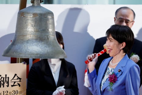 Japan's Prime Minister Sanae Takaichi rings a bell during a ceremony marking the end of trading in 2025 at the Tokyo Stock Exchange (TSE) today