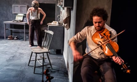 Essential to making this all work … Ultan O’Brien, front, plays his instrument.