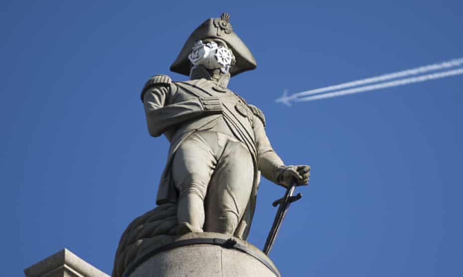 an air mask placed on the statue of lord nelson in trafalgar square by greenpeace activists, london, in april 2016