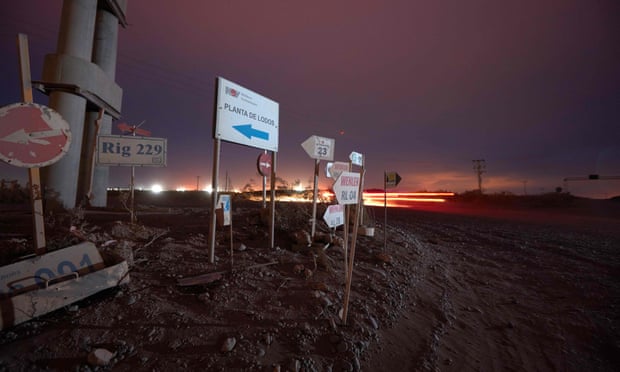 oil and gas company signs in anelo, in the vaca muerta region of argentina