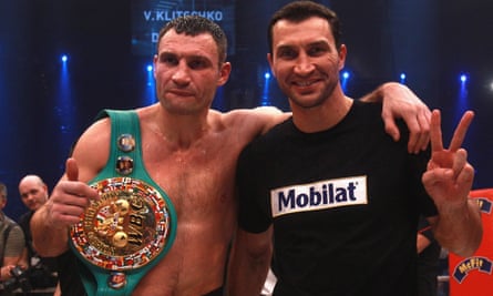 Vitali Klitschko with his brother Wladimir after a successful title defence in 2012
