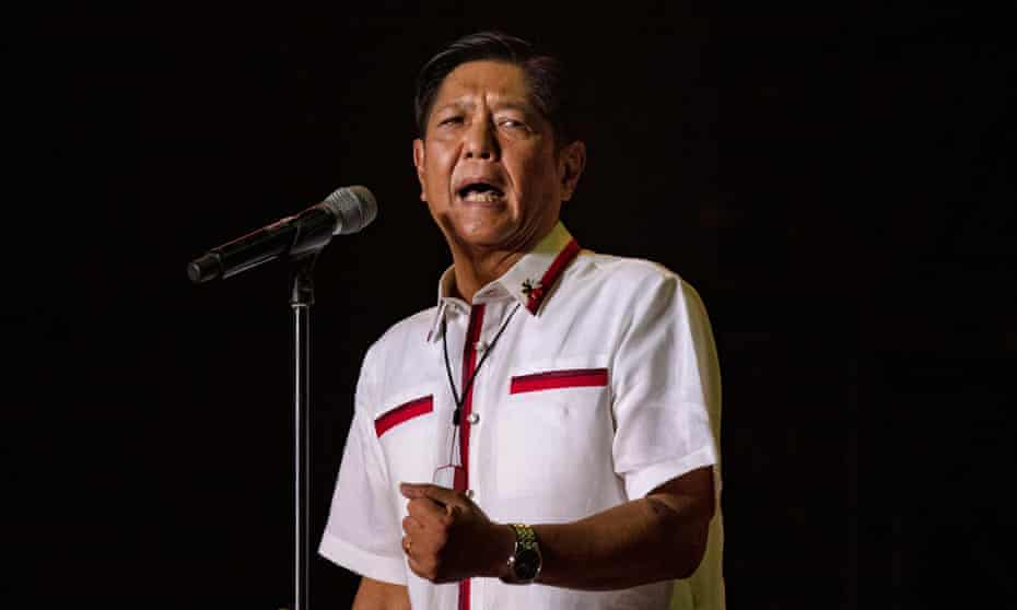 Ferdinand Marcos Jr speaks to supporters during his last campaign rally before the election