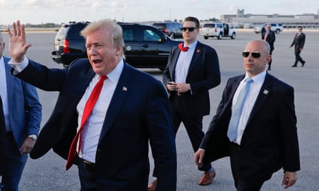President Donald Trump surrounded by members of the Secret Service, including Tony Ornato, right.