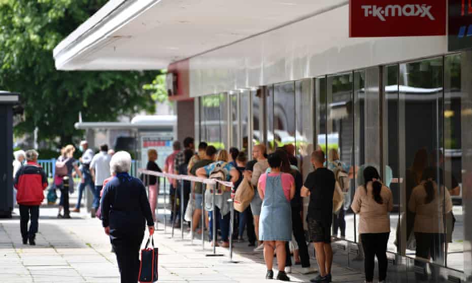 Shoppers queue outside TK Maxx in Plymouth.