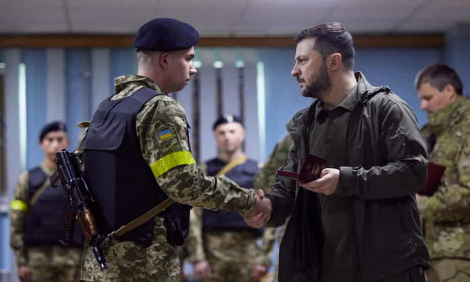 The Ukraine president, Volodymyr Zelenskiy, meets a soldier in Kharkiv.