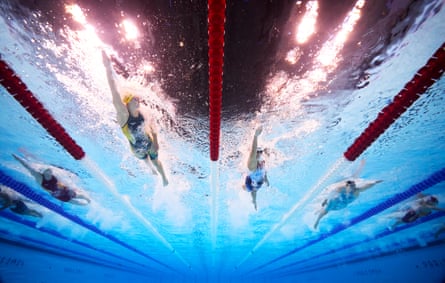 Ariarne Titmus of Team Australia and Katie Ledecky of Team USA compete in the 400m freestyle heats.