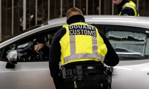 Dutch customs users inspect vehicles disembarking from the ferry from the United Kingdom on arrival at EU territory in Hoek van Holland, The Netherlands, 06 January 2021.