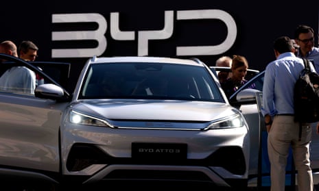 Visitors inspect the China-made BYD Atto 3 at the IAA motor show in Munich