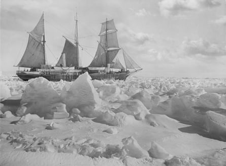 A 1914 photograph of a large sailing vessel in the middle of an icy landscape