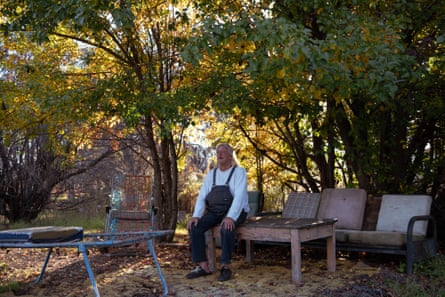 Col Faulker, 68, over 40-year resident of Wollar, NSW sitting by the creek a short walking distance from his home. A town now predomintaly owned by American coal-mining company Peabody.