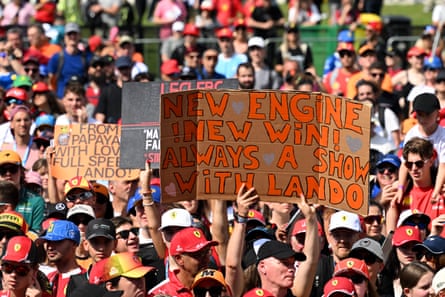 Fans of Lando Norris of McLaren hold up signs at the stage during practice ahead of the F1 Grand Prix of Italy.