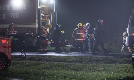 Search and rescue workers and firefighters rescued two people from a small plane which crashed into a power line tower in Maryland, US.