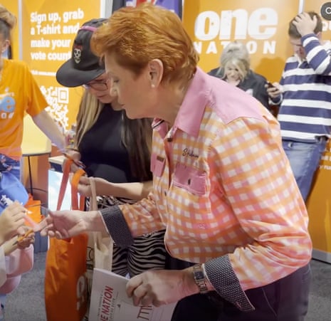 A video posted to Pauline Hanson's Please Explain Facebook account appears to show the One Nation leader in Brisbane holding the colouring book in which Bluey is depicted as being held at knifepoint