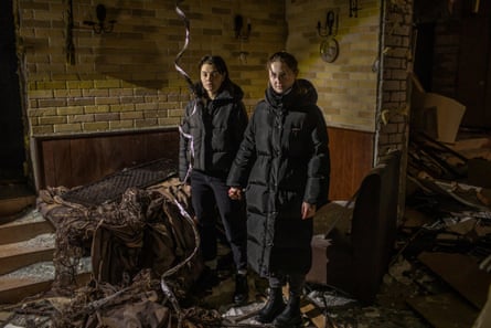 Lika Zavarza and Sasha Babak, employees of the Park Hotel, on the spot where the strike hit.