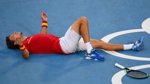 Spain’s Pablo Carreno Busta celebrates after defeating Serbia’s Novak Djokovic.