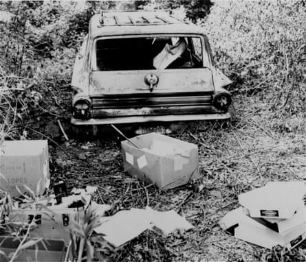 The burned station wagon of three missing civil rights workers - Michael Schwerner, Andrew Goodman, and James Chaney is found in a swampy area near Philadelphia, Miss., June 24, 1964.