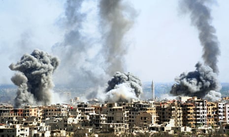 Smoke rises after Syrian army shelling of Douma, eastern Ghouta, 7 April.