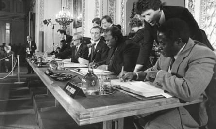 Robert Mugabe signing a peace agreement at Lancaster House, London, December 1979.