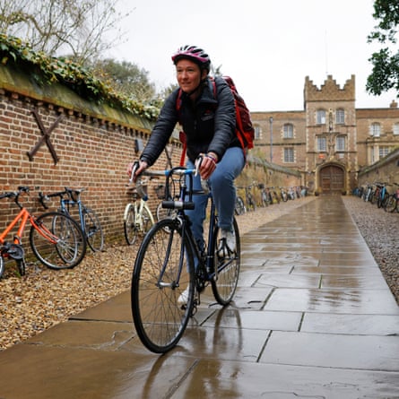 Jenna Armstrong, the women’s president of the Cambridge University Boat Club, cycling down the Chimney, the grand entrance to Jesus College where she is a member, to go to the other side of the city to carry out more of her PhD research at the department of physiology, development and neuroscience.
