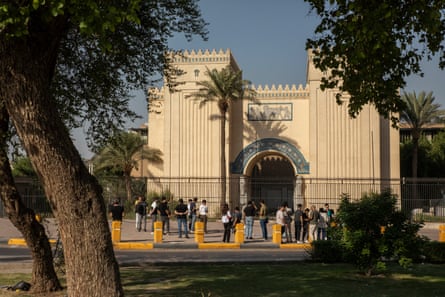 People enjoy last year’s Baghdad Walk in front of the Iraqi Museum.