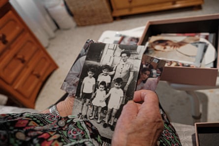 Silvestra holding an old photograph