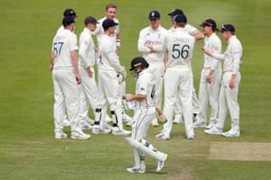 Tom Latham walks after losing his wicket.