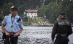 out of focus Norwegian police officers on Utøya waterfront, NorwayAFP PHOTO / ODD ANDERSENODD ANDERSEN/AFP/Getty Images
