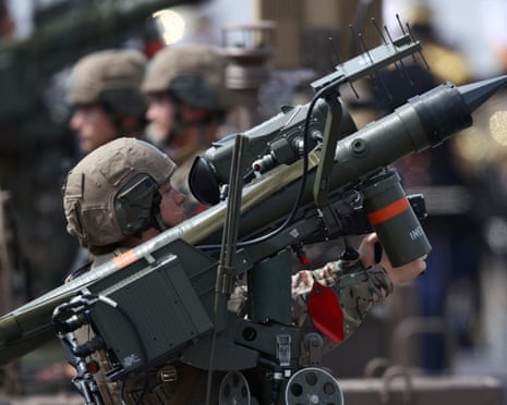 A French soldier with a Mistral Missile parades during the annual Bastille Day military parade on the Place de la Concorde in Paris, France.