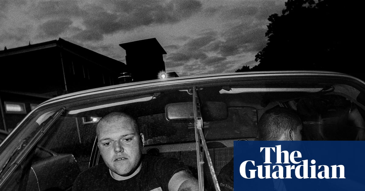 Two skinheads counting the takings from a neo-Nazi gig: Leo Regan’s best photograph