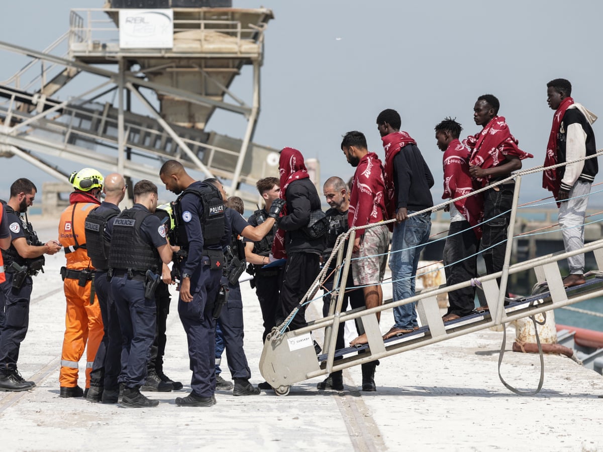 Dinghy carrying 173 people capsizes in Channel after engine catches fire | UK news | The Guardian