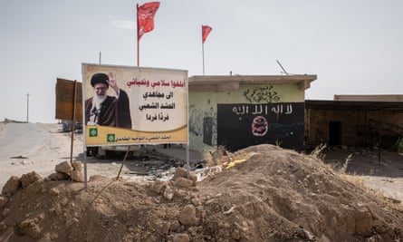 Shia signs replace Islamic State ones near Ba’aj.