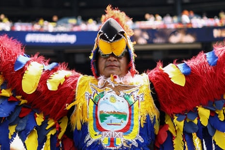 An Ecuador fan dressed as a bird