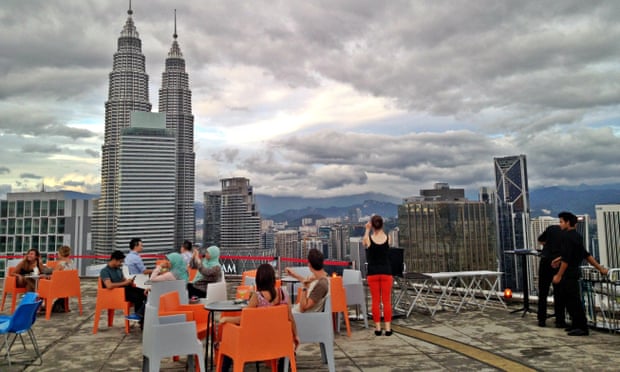 Daytime view of the helicopter landing pad bar, called Heli, with a view over Kuala Lumpur, Malaysia.