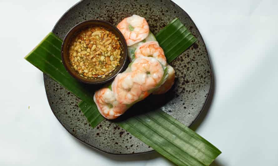 ‘Translucent rice paper skins are wrapped around bulky king prawns’: summer rolls.