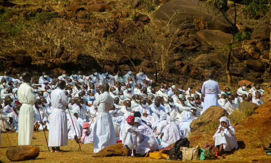 A group of worshipers gather at a hill in Kuwadzana, Zimbabwe.