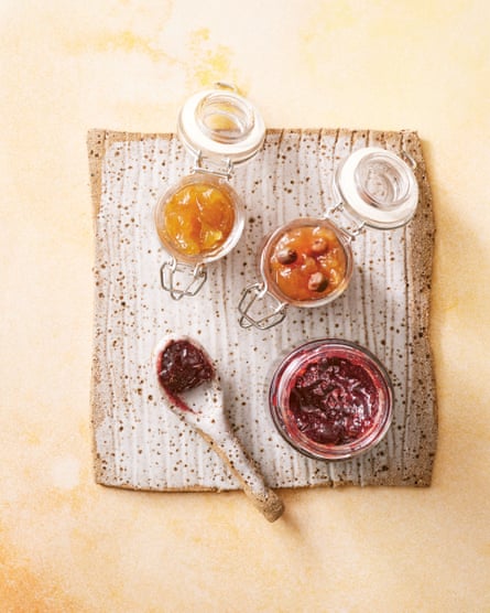 Open jars of monterey jam and rosella jam.