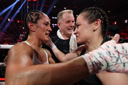 Katie Taylor, right, embraces Amanda Serrano after Friday’s fight.