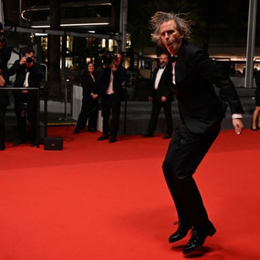 Let’s Dance … Brett Morgen dances as he arrives at the 75th edition of the Cannes film festival for the screening of Moonage Daydream.