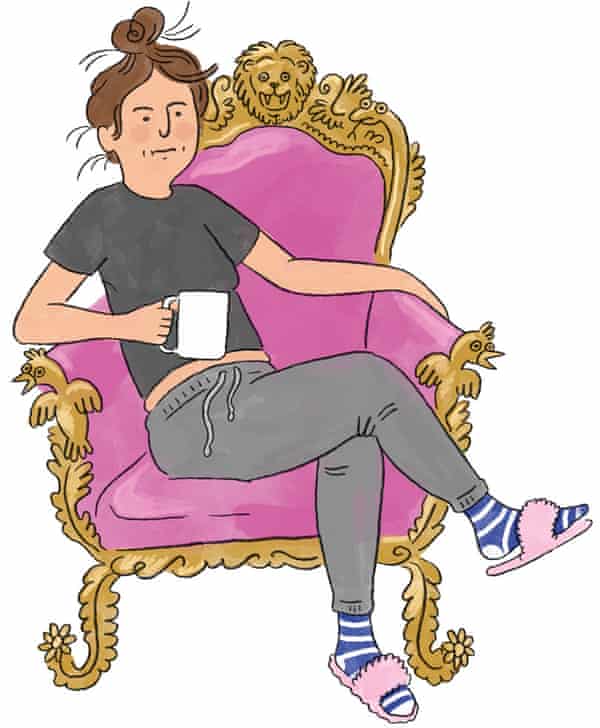 Woman with mug of tea in pink chair