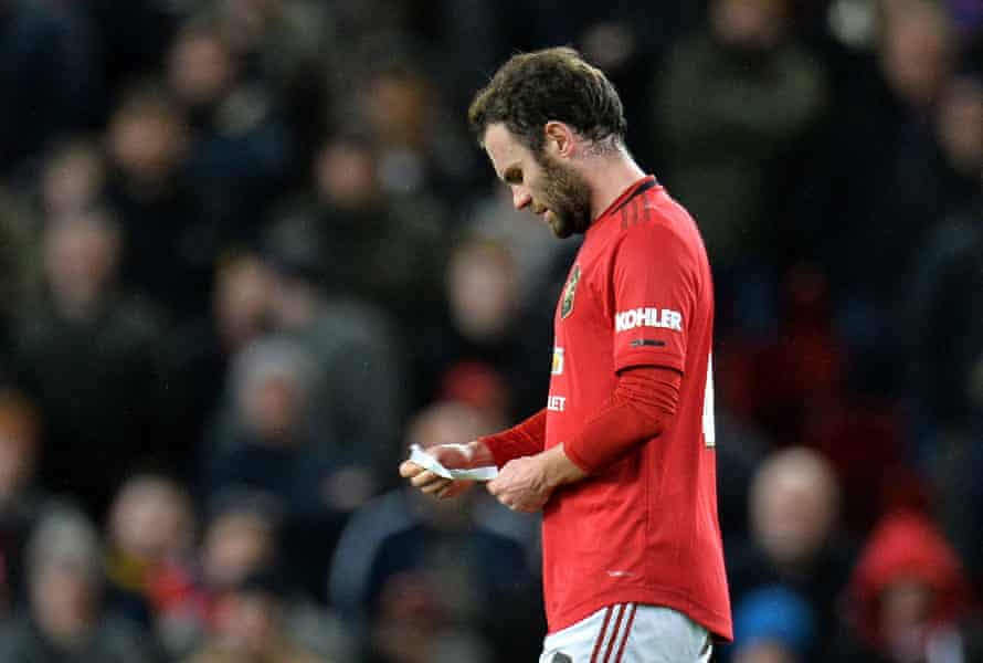 Mata reads his managers note.