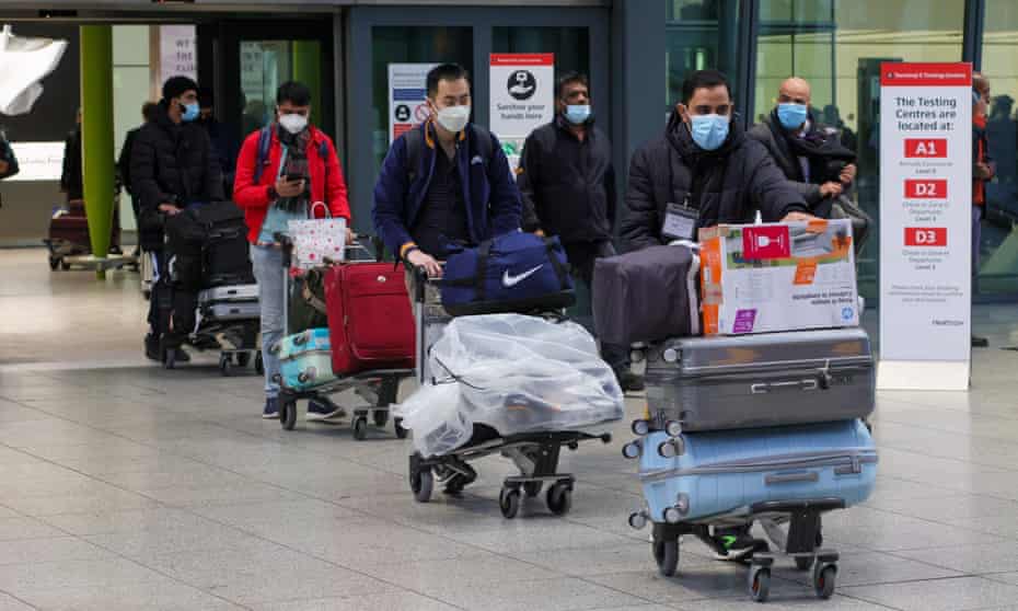 Passengers at London’s Heathrow airport.