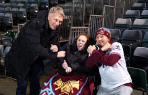 West Ham United manager David Moyes poses for a photo with Irons fans before their match at Priestfield Stadium against Gillingham.