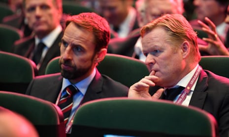 England manager Gareth Southgate sat beside his Dutch counterpart Ronald Koeman during the draw – the Netherlands will play Germany and Northern Ireland in Group B. 